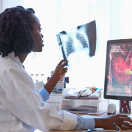 a woman holding xray