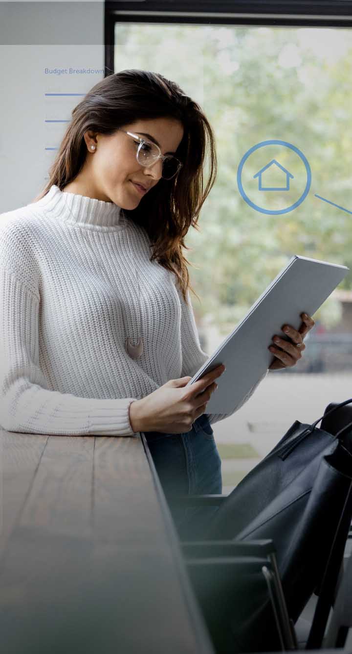 Woman looking at tablet with banking apps