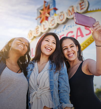 three girls taking selfie