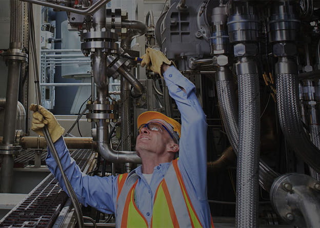 Engineer examining instrumentation cables