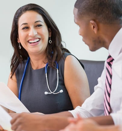 smiling female doctor with executive