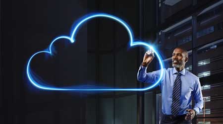 man drawing a digital cloud outline