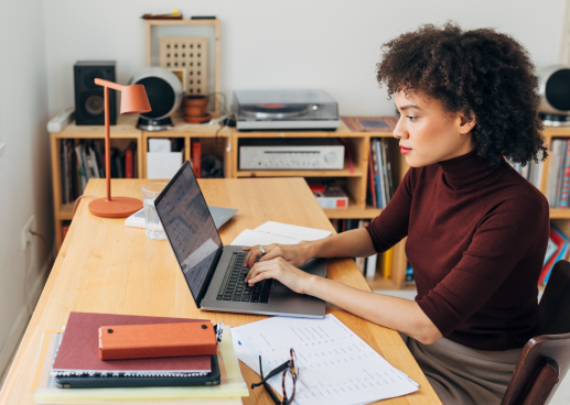 woman working on laptop at home