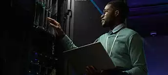 man working in a datacenter