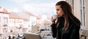 Female taking coffee