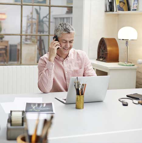 People working in small victorian style creative office