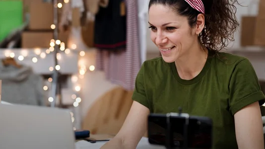 woman working from home on devices