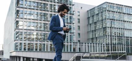 young professional looking at mobile phone