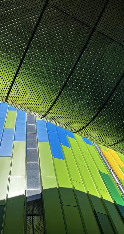 Colorful buildings and motorway overpass in business district