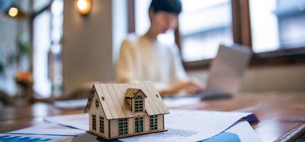 Tiny miniature house placed on a table