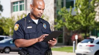 police officer using a tablet