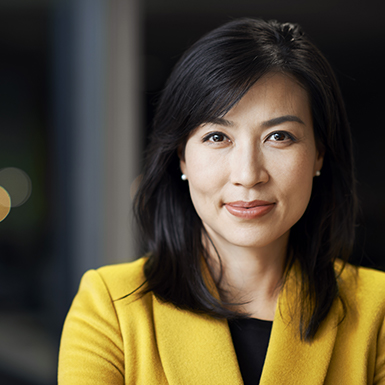 Portrait of an Asian businesswoman at office at night