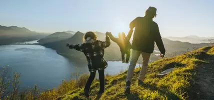 family hiking on mountain