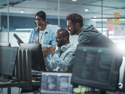 Diverse Group of Professionals Meeting in Modern Office